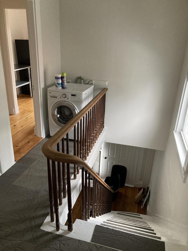 11 Gardner Ave, Machias, ME 04654 - staircase featuring wood finished floors and washer / dryer