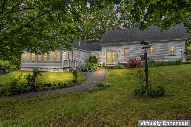 507 Ford Quint Rd, North Berwick, ME 03906 - view of front of property with a front yard and roof with shingles