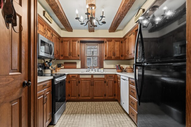 507 Ford Quint Rd, North Berwick, ME 03906 - kitchen with appliances with stainless steel finishes, light countertops, beamed ceiling, a chandelier, and brown cabinetry