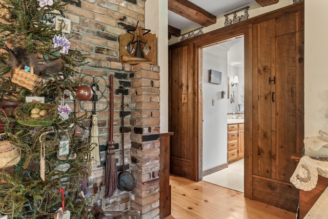 507 Ford Quint Rd, North Berwick, ME 03906 - corridor featuring light wood finished floors and beam ceiling