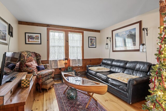 507 Ford Quint Rd, North Berwick, ME 03906 - living area with light wood finished floors and wainscoting