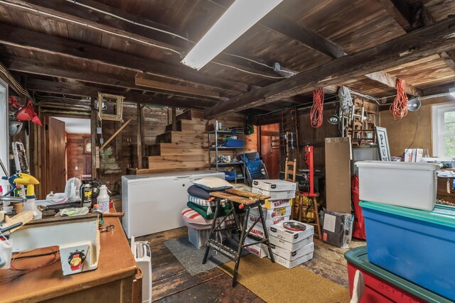 507 Ford Quint Rd, North Berwick, ME 03906 - below grade area featuring refrigerator, wooden walls, stairway, and wood ceiling