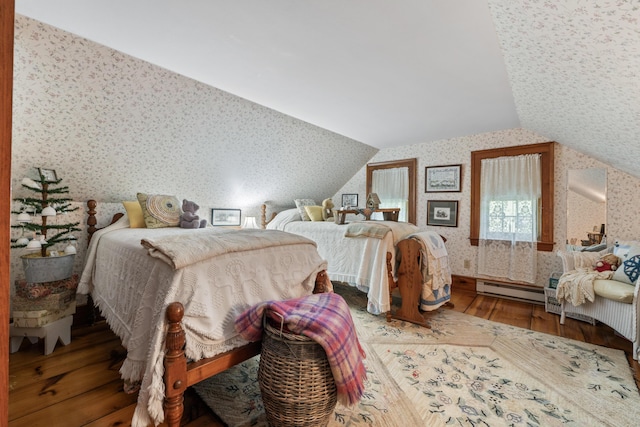 507 Ford Quint Rd, North Berwick, ME 03906 - bedroom featuring wallpapered walls, hardwood / wood-style flooring, vaulted ceiling, and a baseboard radiator
