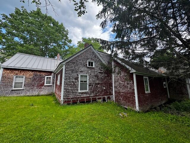 22 Easy St, Canaan, ME 04924 - view of side of property featuring a yard