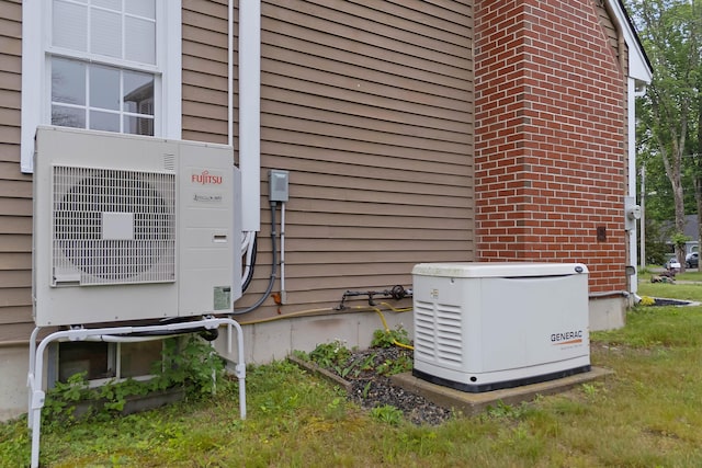 26 Ferncroft Rd, York, ME 03909 - exterior view of a power unit and an ac unit
