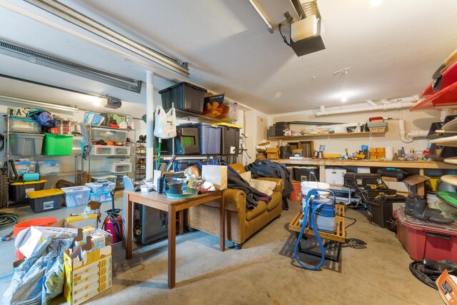26 Ferncroft Rd, York, ME 03909 - garage featuring a garage door opener