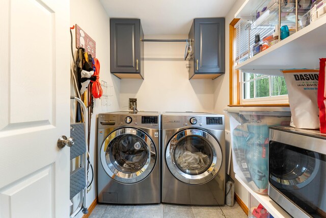 26 Ferncroft Rd, York, ME 03909 - laundry room featuring cabinet space, washing machine and clothes dryer, and light tile patterned floors