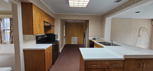 91 Mayflower Hill Dr, Waterville, ME 04901 - kitchen with black appliances, brown cabinets, under cabinet range hood, dark colored carpet, and crown molding