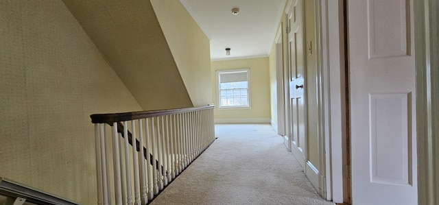 91 Mayflower Hill Dr, Waterville, ME 04901 - corridor with light colored carpet, ornamental molding, and an upstairs landing
