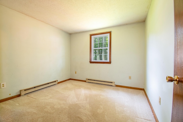 24 Down E Ln, Scarborough, ME 04074 - empty room with a baseboard radiator, carpet floors, and a textured ceiling