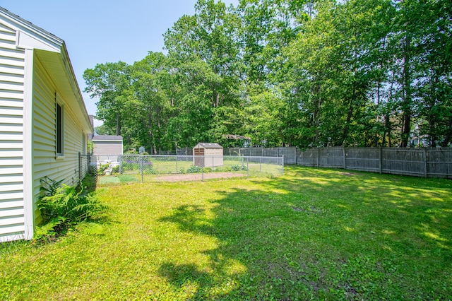 24 Down E Ln, Scarborough, ME 04074 - fenced backyard with a storage unit