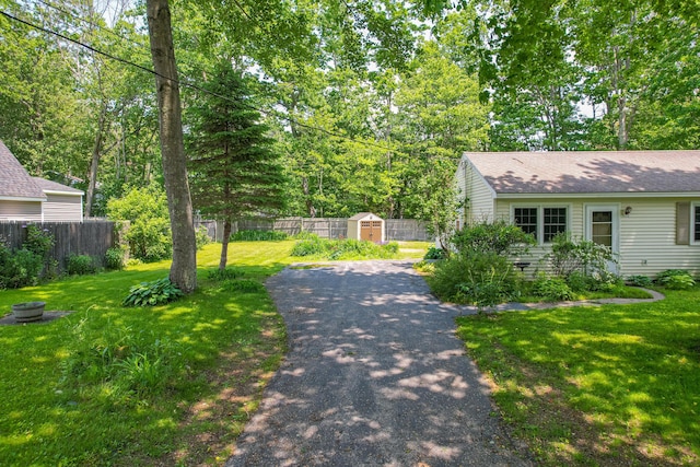24 Down E Ln, Scarborough, ME 04074 - fenced backyard with a storage shed