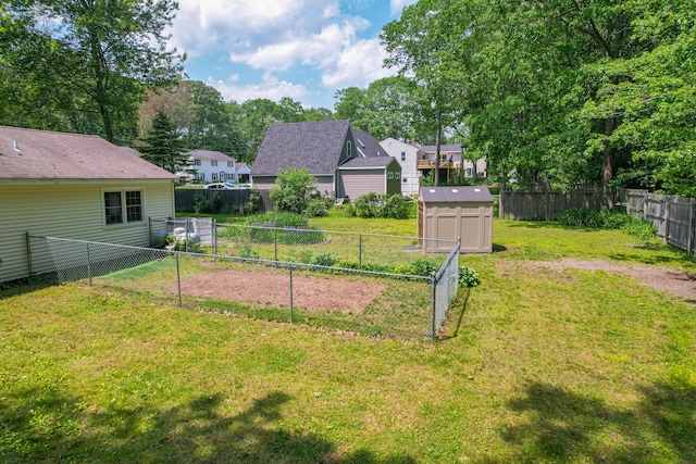 24 Down E Ln, Scarborough, ME 04074 - fenced backyard with a residential view and a shed