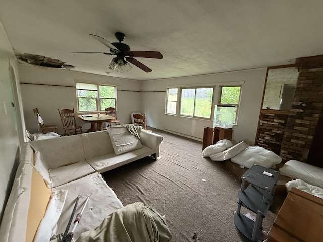13 Mount Desert Dr, Bangor, ME 04401 - living area with carpet, a ceiling fan, and a baseboard heating unit