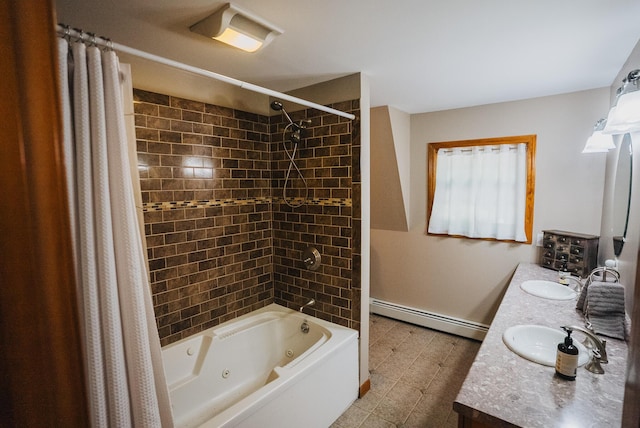 627 Green Lake Rd, Dedham, ME 04429 - full bath featuring a baseboard radiator, a combined bath / shower with jetted tub, and double vanity