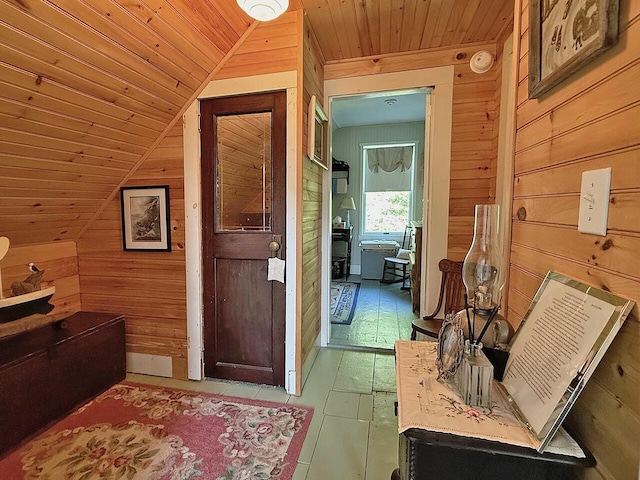 99 Huddle Rd, Bristol, ME 04554 - entryway featuring wood walls, wooden ceiling, and lofted ceiling