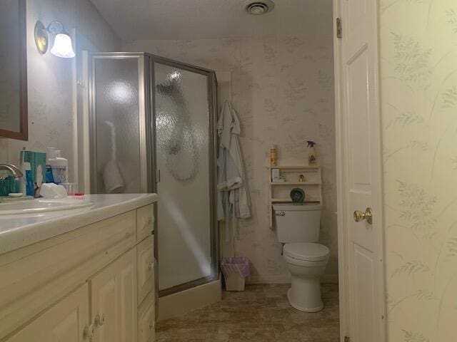 48 13th St, Bangor, ME 04401 - full bathroom featuring vanity, wallpapered walls, and a stall shower