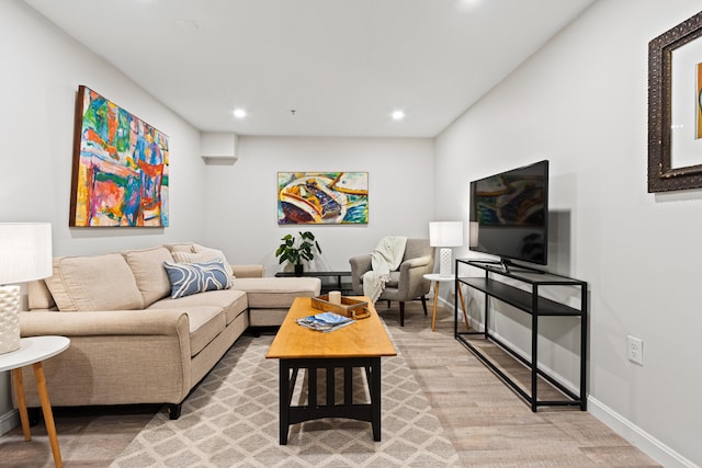 16 Guilford Ct Unit B1, Portland, ME 04101 - living room featuring light wood-type flooring and recessed lighting