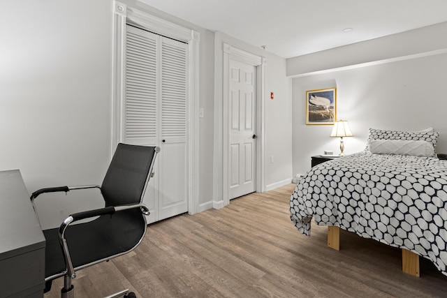 16 Guilford Ct Unit B1, Portland, ME 04101 - bedroom featuring wood finished floors and a desk