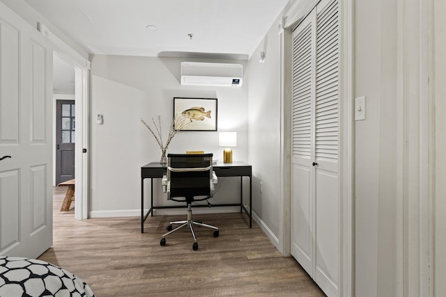 16 Guilford Ct Unit B1, Portland, ME 04101 - office area with wood finished floors and a wall unit AC