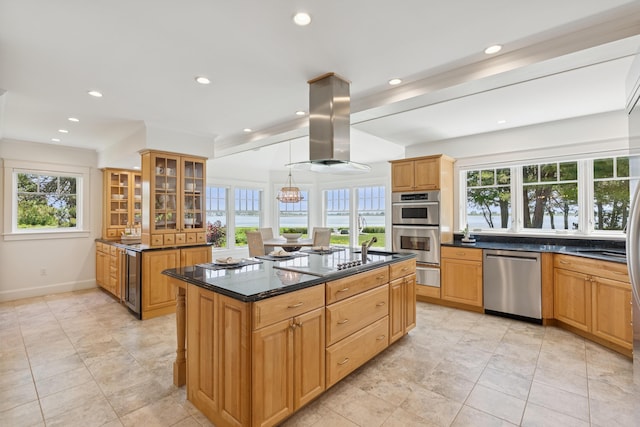 22 Channel Cove Ln, Biddeford, ME 04005 - kitchen with stainless steel appliances, a warming drawer, island exhaust hood, healthy amount of natural light, and recessed lighting