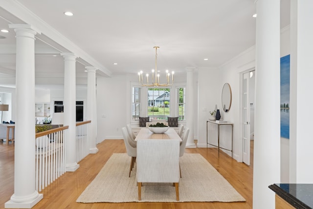 22 Channel Cove Ln, Biddeford, ME 04005 - dining space with light wood finished floors, recessed lighting, a chandelier, and crown molding