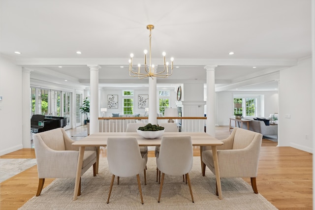 22 Channel Cove Ln, Biddeford, ME 04005 - dining area with decorative columns, recessed lighting, light wood-type flooring, a chandelier, and crown molding