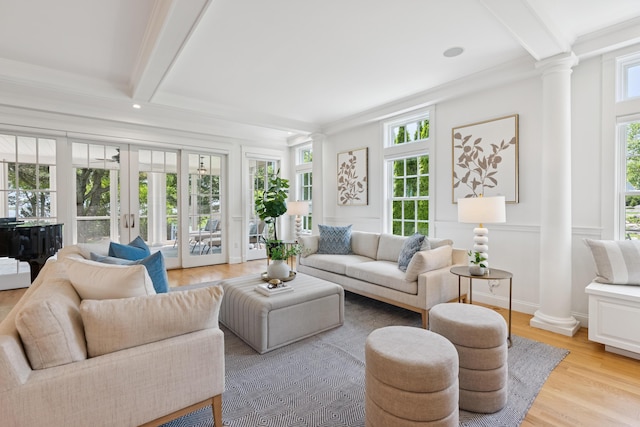 22 Channel Cove Ln, Biddeford, ME 04005 - living room with ornate columns, beamed ceiling, light wood-style floors, and french doors