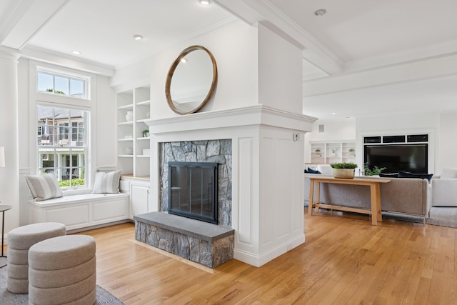 22 Channel Cove Ln, Biddeford, ME 04005 - living room featuring a fireplace, light wood-type flooring, ornamental molding, built in shelves, and recessed lighting