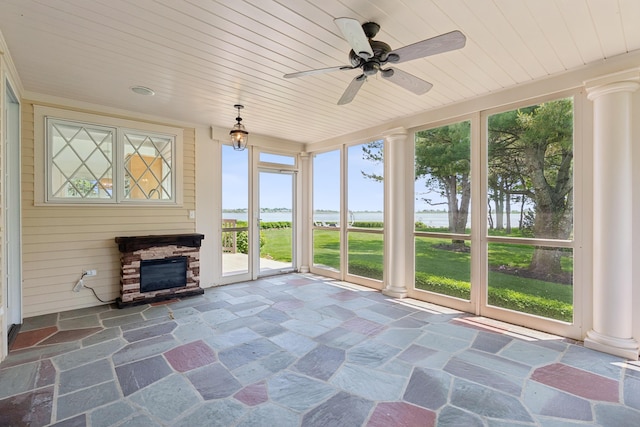 22 Channel Cove Ln, Biddeford, ME 04005 - unfurnished sunroom with a water view, stone flooring, wooden ceiling, and ornate columns