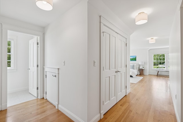 22 Channel Cove Ln, Biddeford, ME 04005 - corridor featuring light wood-style flooring and baseboards