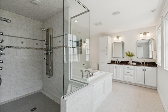 22 Channel Cove Ln, Biddeford, ME 04005 - full bathroom with walk in shower, double vanity, tile patterned floors, and recessed lighting