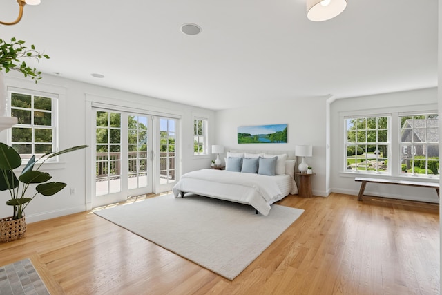 22 Channel Cove Ln, Biddeford, ME 04005 - bedroom featuring access to outside and wood finished floors
