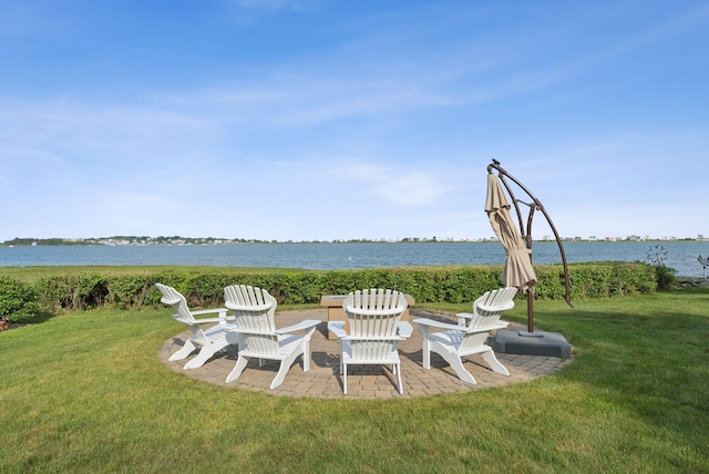 22 Channel Cove Ln, Biddeford, ME 04005 - view of grassy yard featuring a patio and a water view