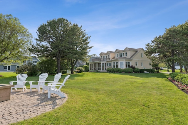 22 Channel Cove Ln, Biddeford, ME 04005 - view of green lawn with a patio area