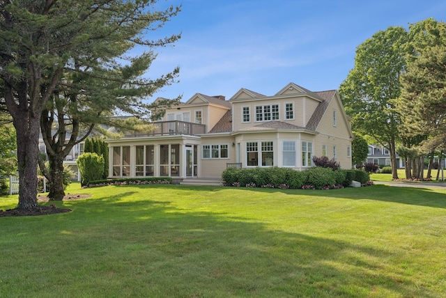 22 Channel Cove Ln, Biddeford, ME 04005 - rear view of house with a balcony, a sunroom, and a yard