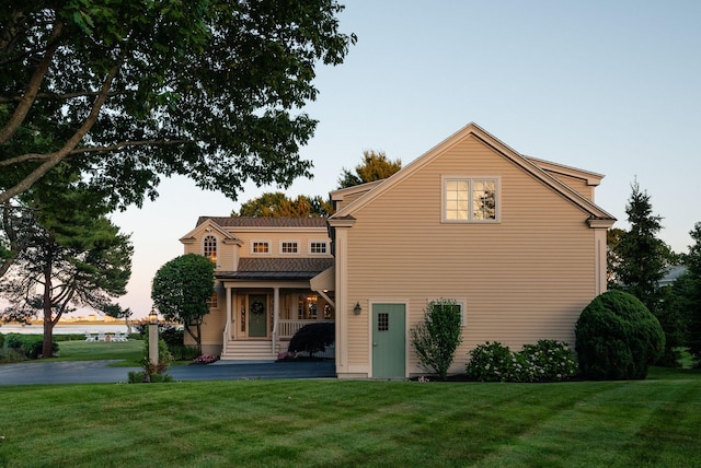 22 Channel Cove Ln, Biddeford, ME 04005 - rear view of property featuring a yard and a patio area