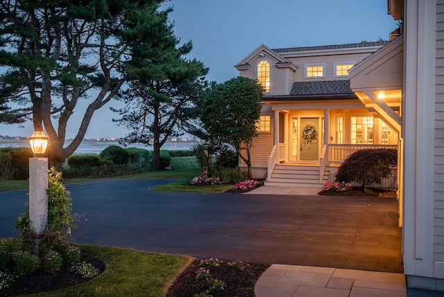 22 Channel Cove Ln, Biddeford, ME 04005 - view of front of property featuring roof with shingles and a porch