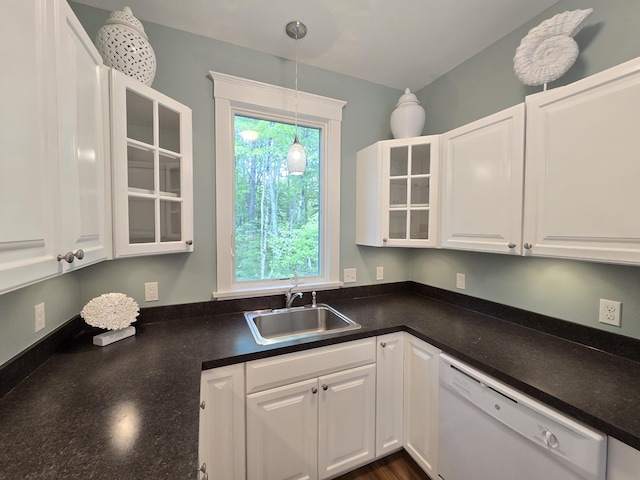 1 Old County Rd Unit 140, Wells, ME 04090 - kitchen with dishwasher, dark countertops, white cabinetry, and pendant lighting