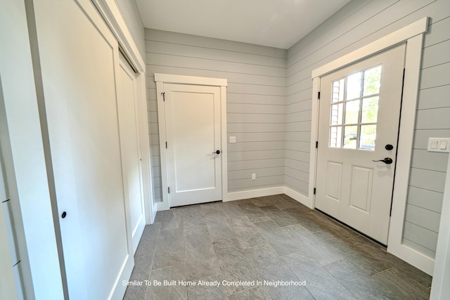5 Whitetail St, Belfast, ME 04915 - doorway to outside featuring wooden walls