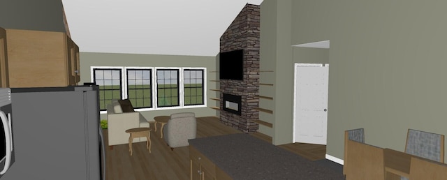 5 Whitetail St, Belfast, ME 04915 - living room with a fireplace, wood finished floors, a high ceiling, and washer / clothes dryer