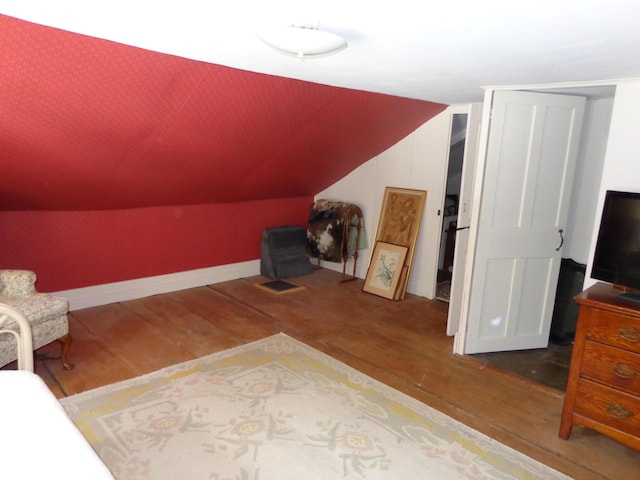 1089 Maplewood Rd, Newfield, ME 04095 - bedroom with wood finished floors and vaulted ceiling