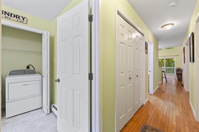 47 Double M Ln, Woolwich, ME 04579 - hall featuring washer / clothes dryer, a baseboard heating unit, and light wood-style floors