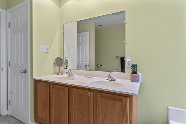 47 Double M Ln, Woolwich, ME 04579 - bathroom featuring double vanity and tile patterned floors