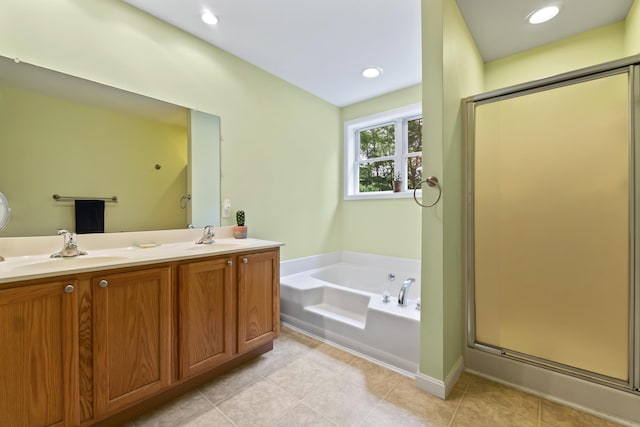 47 Double M Ln, Woolwich, ME 04579 - full bath featuring a garden tub, a shower stall, double vanity, and tile patterned floors