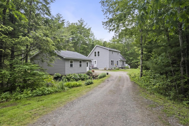 47 Double M Ln, Woolwich, ME 04579 - view of front of property with dirt driveway