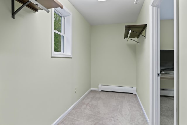 47 Double M Ln, Woolwich, ME 04579 - walk in closet featuring a baseboard heating unit and carpet