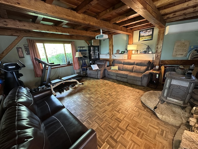 396 Smyrna Town Line Rd, Smyrna, ME 04780 - living room with a wood stove and a wooden ceiling with exposed beams