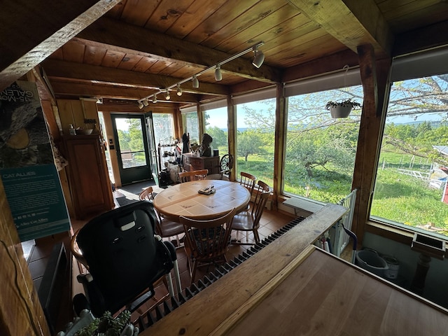 396 Smyrna Town Line Rd, Smyrna, ME 04780 - sunroom with track lighting and beam ceiling