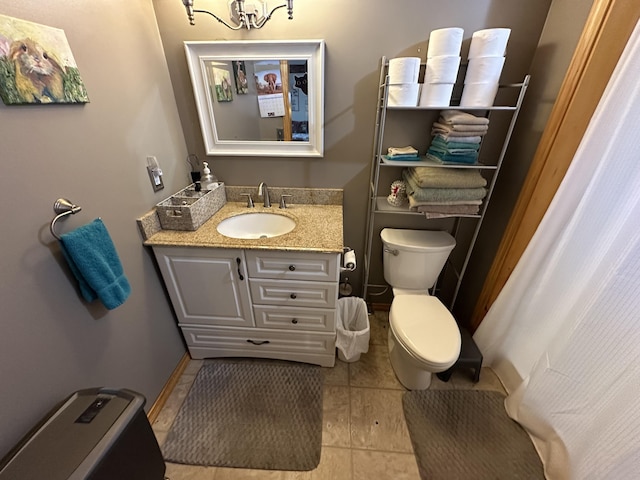 396 Smyrna Town Line Rd, Smyrna, ME 04780 - bathroom with vanity, a chandelier, and tile patterned flooring